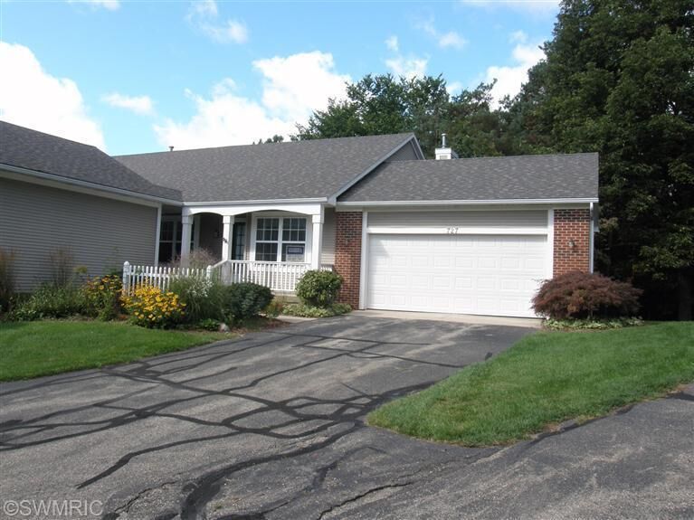 Property Photo:  727 Strawberry Valley Avenue NW  MI 49321 
