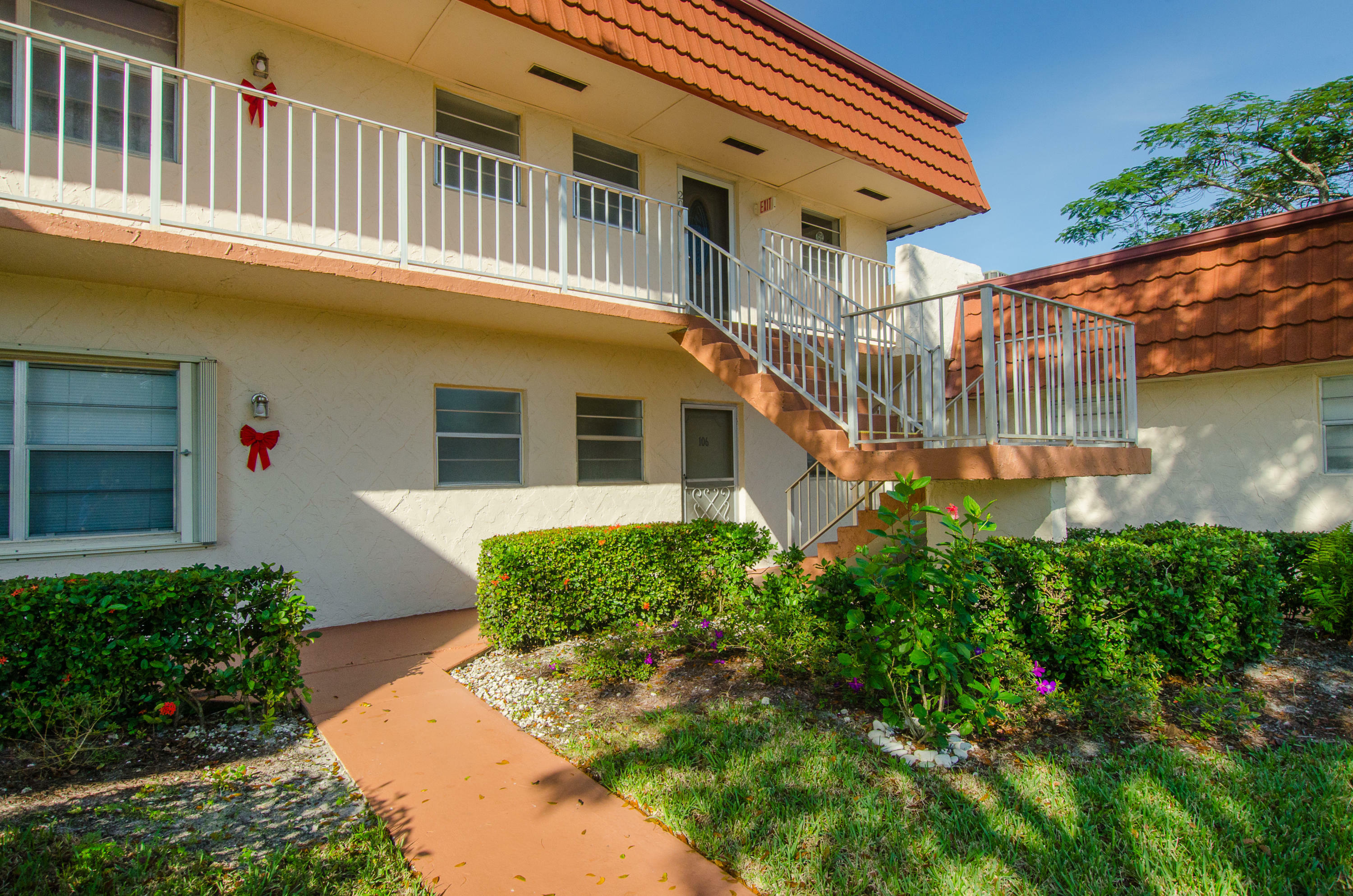 Property Photo:  12006 Poinciana Boulevard 106  FL 33411 