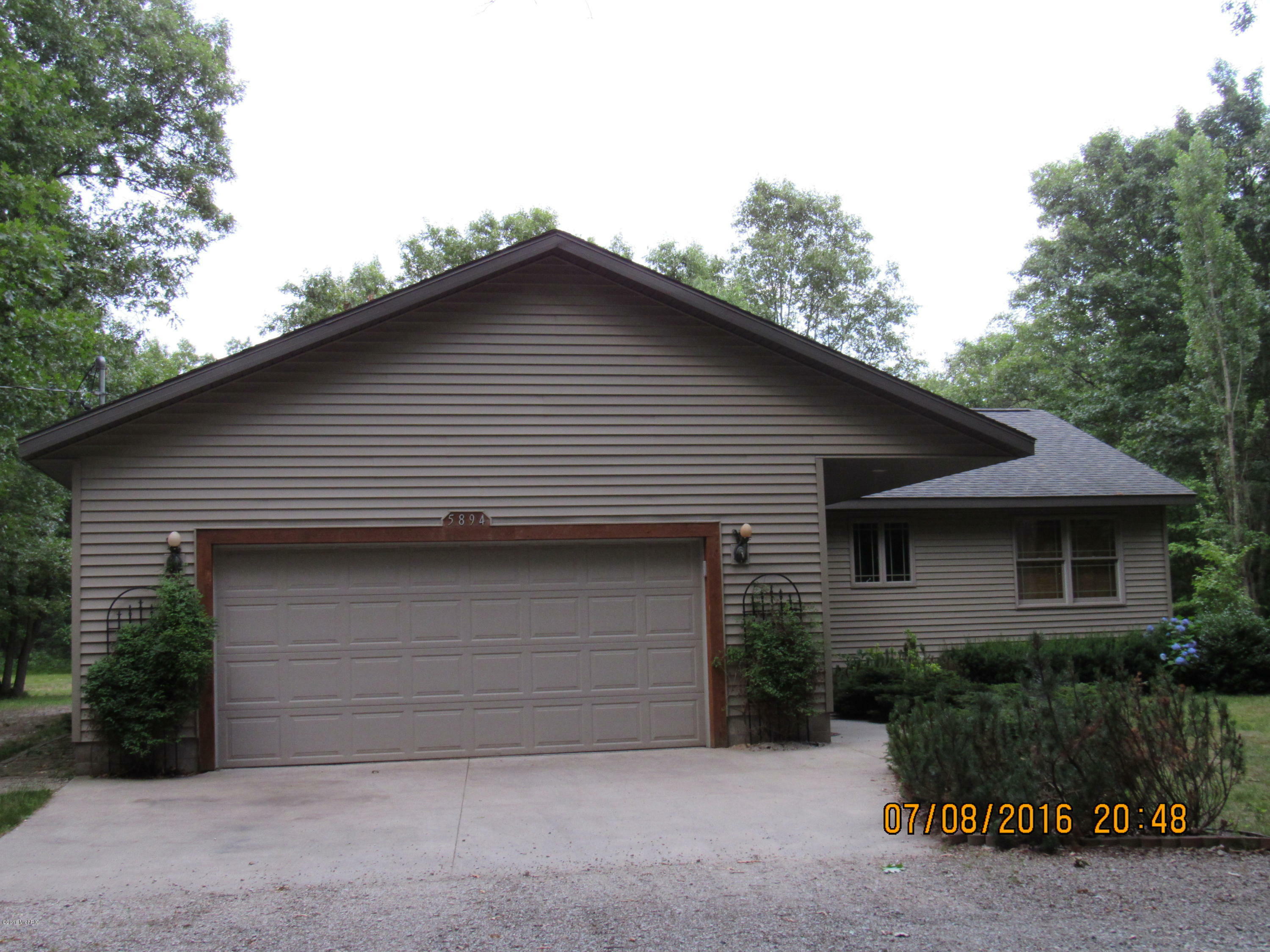 Property Photo:  5894 Fowler Road  MI 49457 