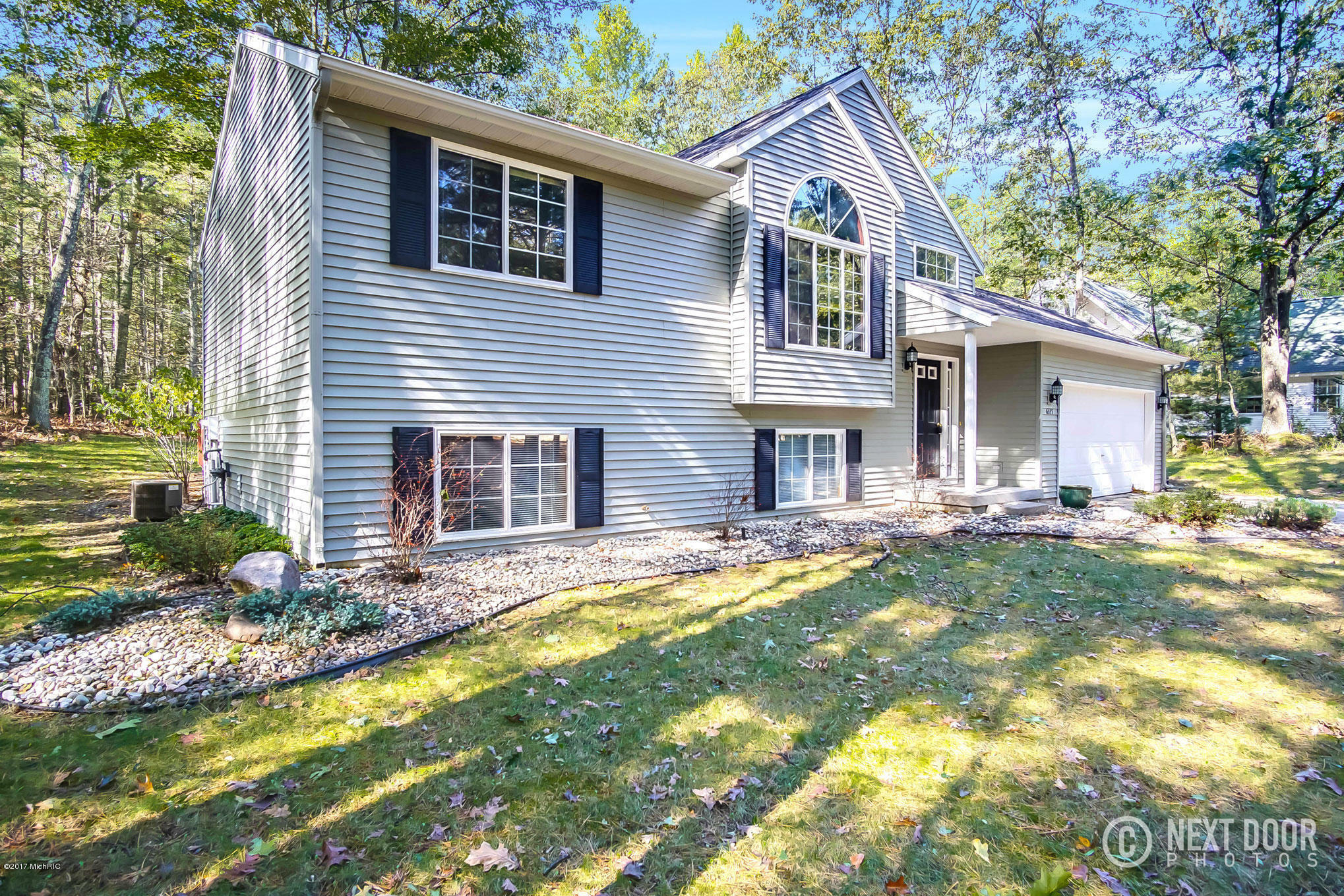 Property Photo:  6335 Iroquois Road  MI 49449 