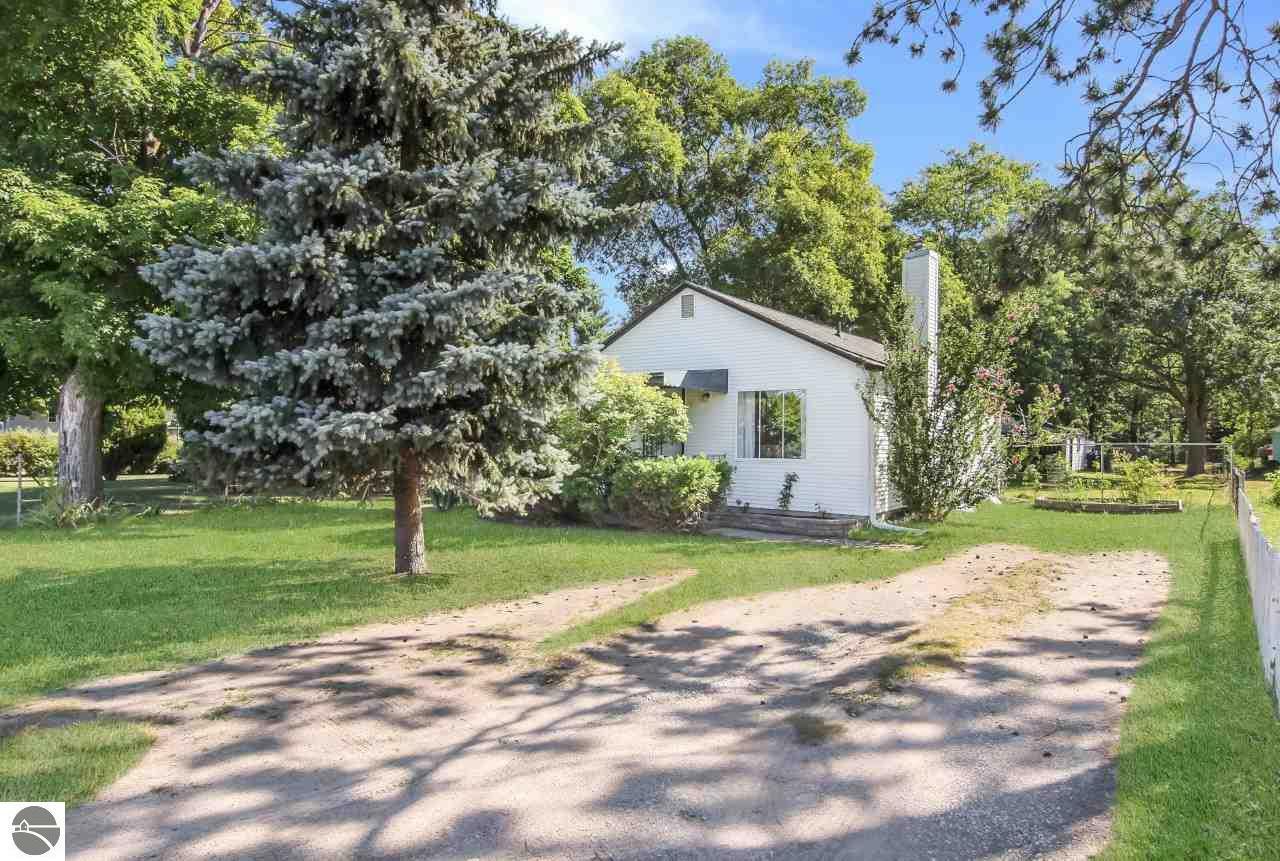 Property Photo:  1121 Barlow Street  MI 49686 