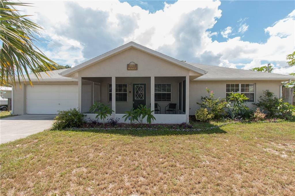 Property Photo:  9915 Holly Street  FL 32976 