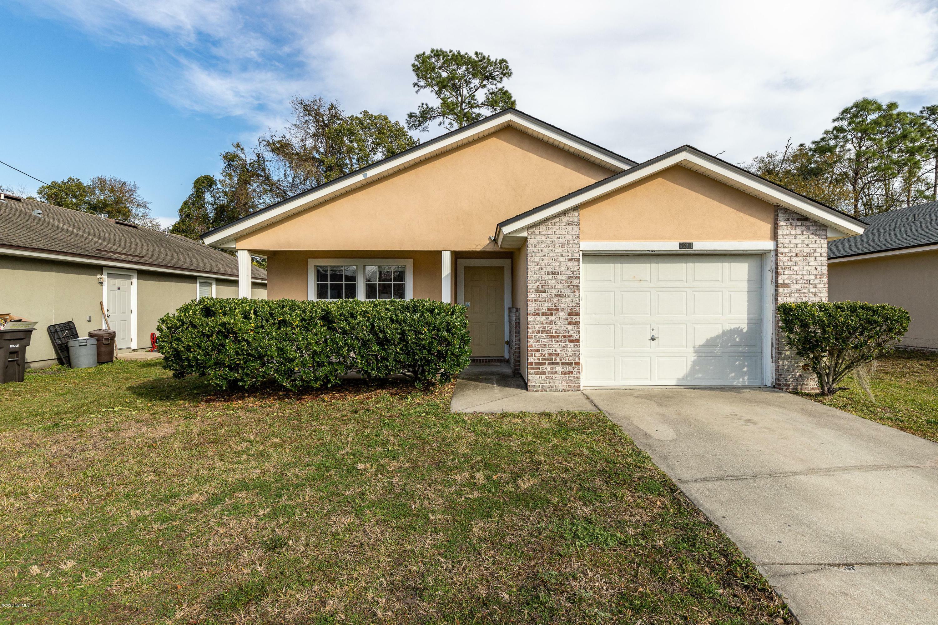 Property Photo:  8211 Maple Street  FL 32244 