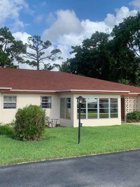 Property Photo:  4875 NW 2nd Street C  FL 33445 