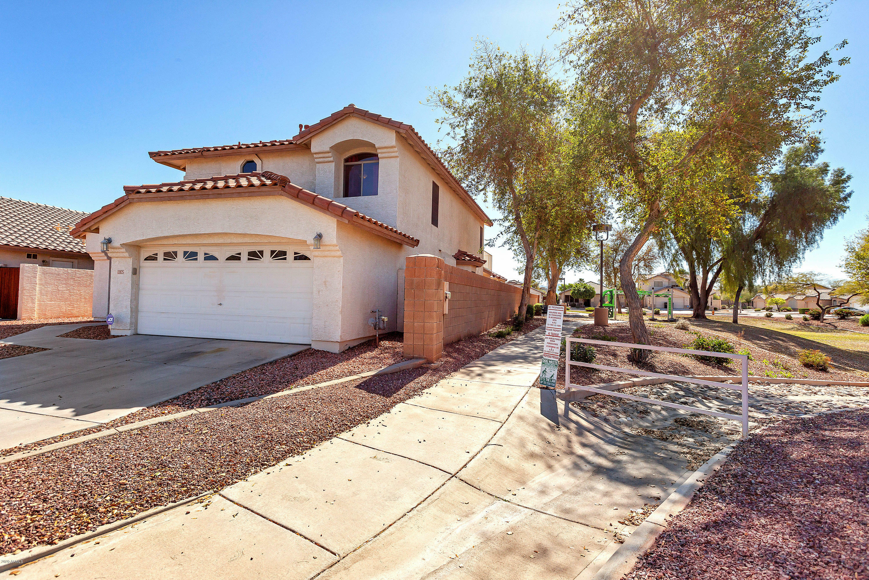 Property Photo:  12825 W Palm Lane  AZ 85392 