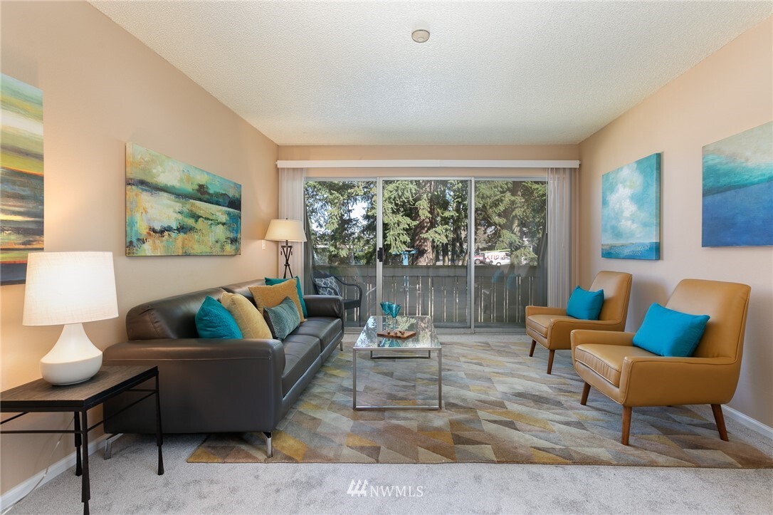 Property Photo:  4823  180th Street SW H203  WA 98037 