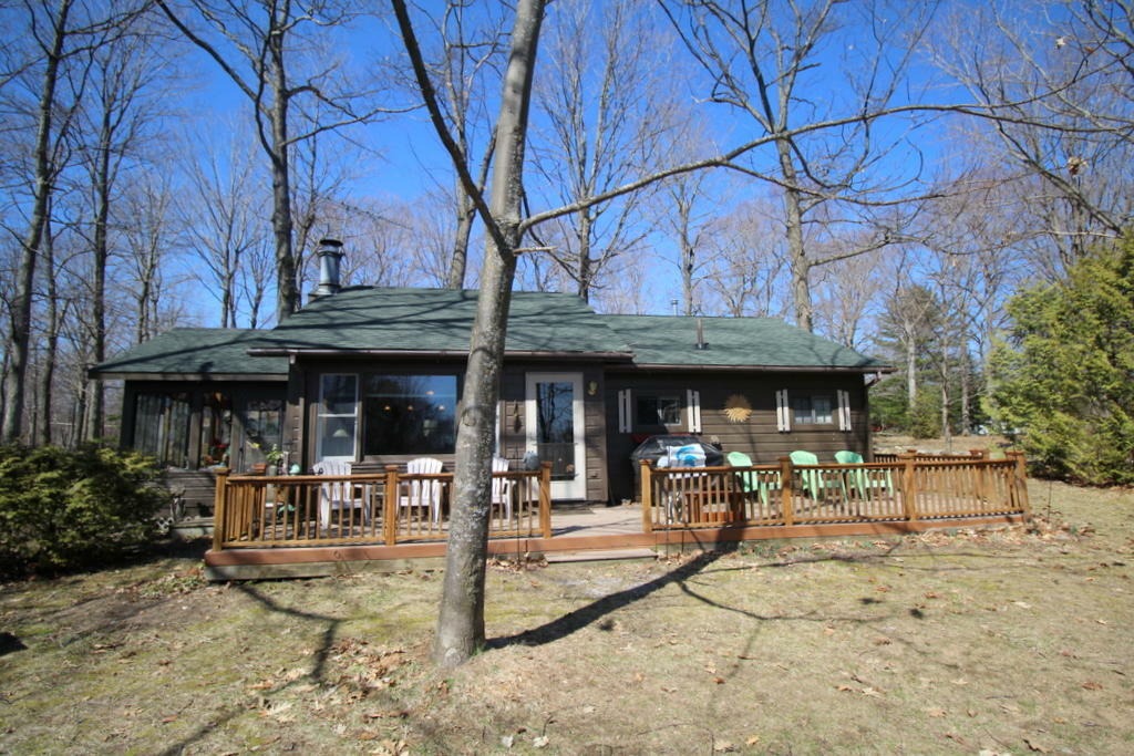 Property Photo:  8664 Paradise Trail  MI 49718 