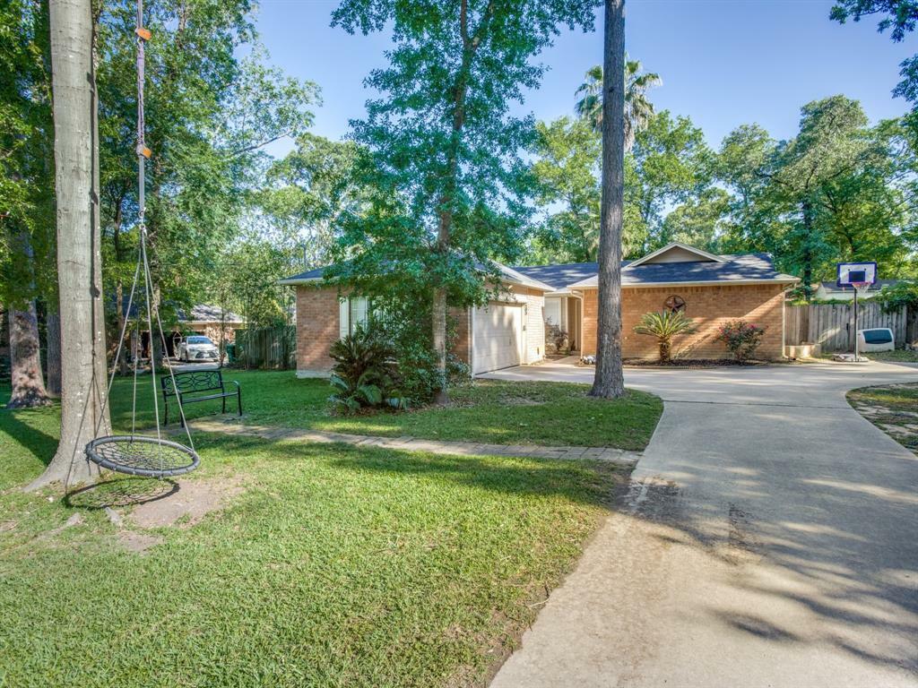 Property Photo:  205 Tupelo Lane  TX 77304 