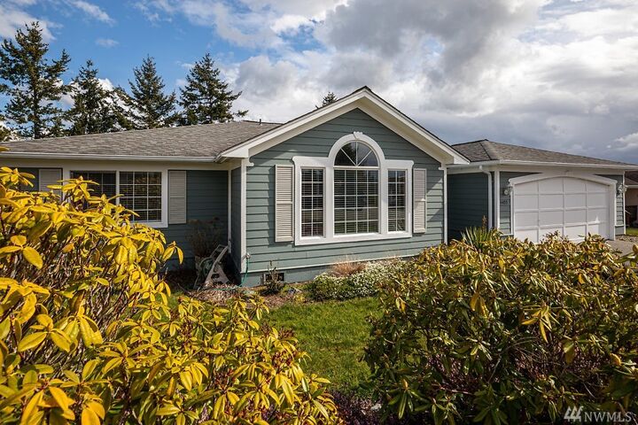 Property Photo: 4405 Glasgow Way WA 98221