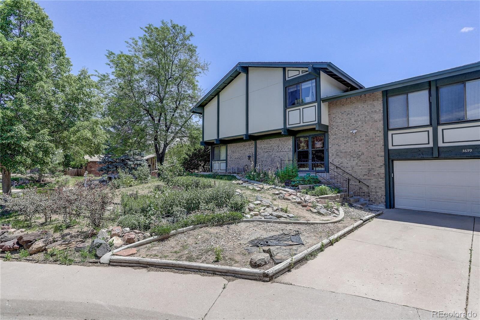 Property Photo: 3699 S Helena Way CO 80013