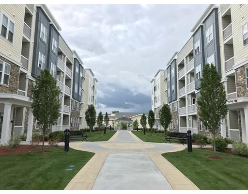 Property Photo: 130 University Ave 1404 MA 02090
