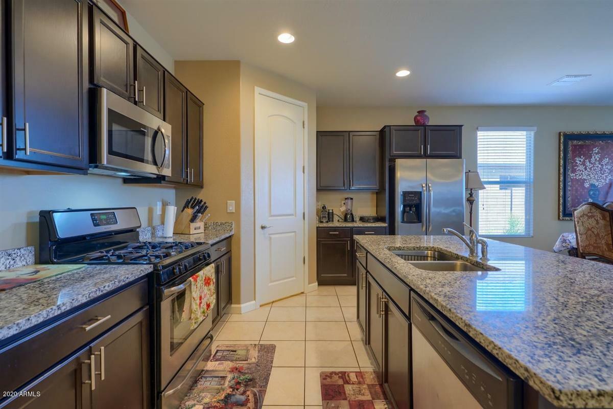 Property Photo:  13631 W Desert Moon Way  AZ 85383 