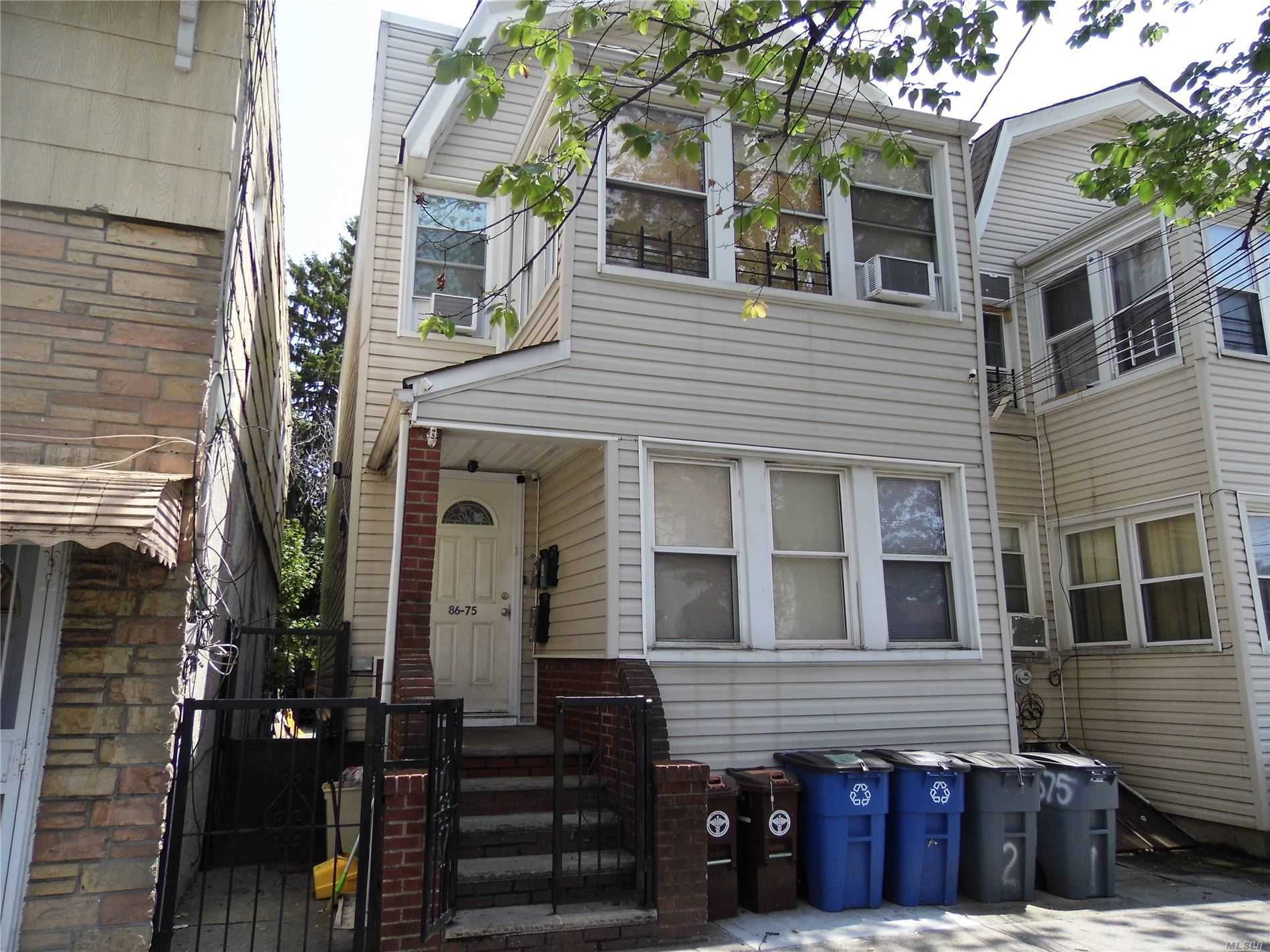 Property Photo:  86-75 80th Street  NY 11421 