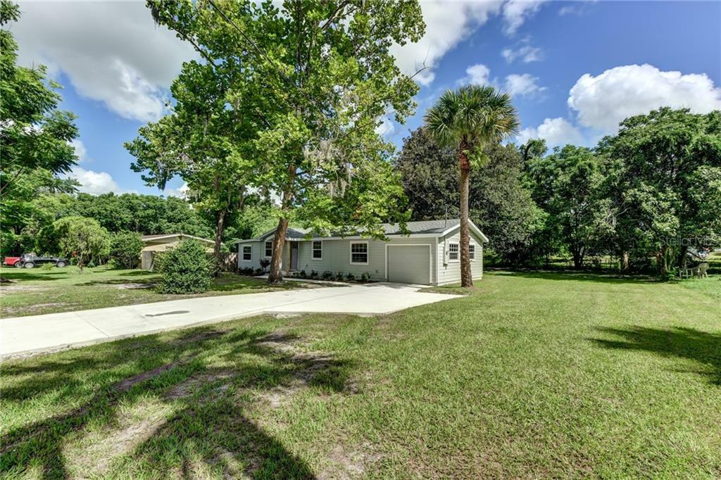 Property Photo:  245 W Palmetto Avenue  FL 32720 