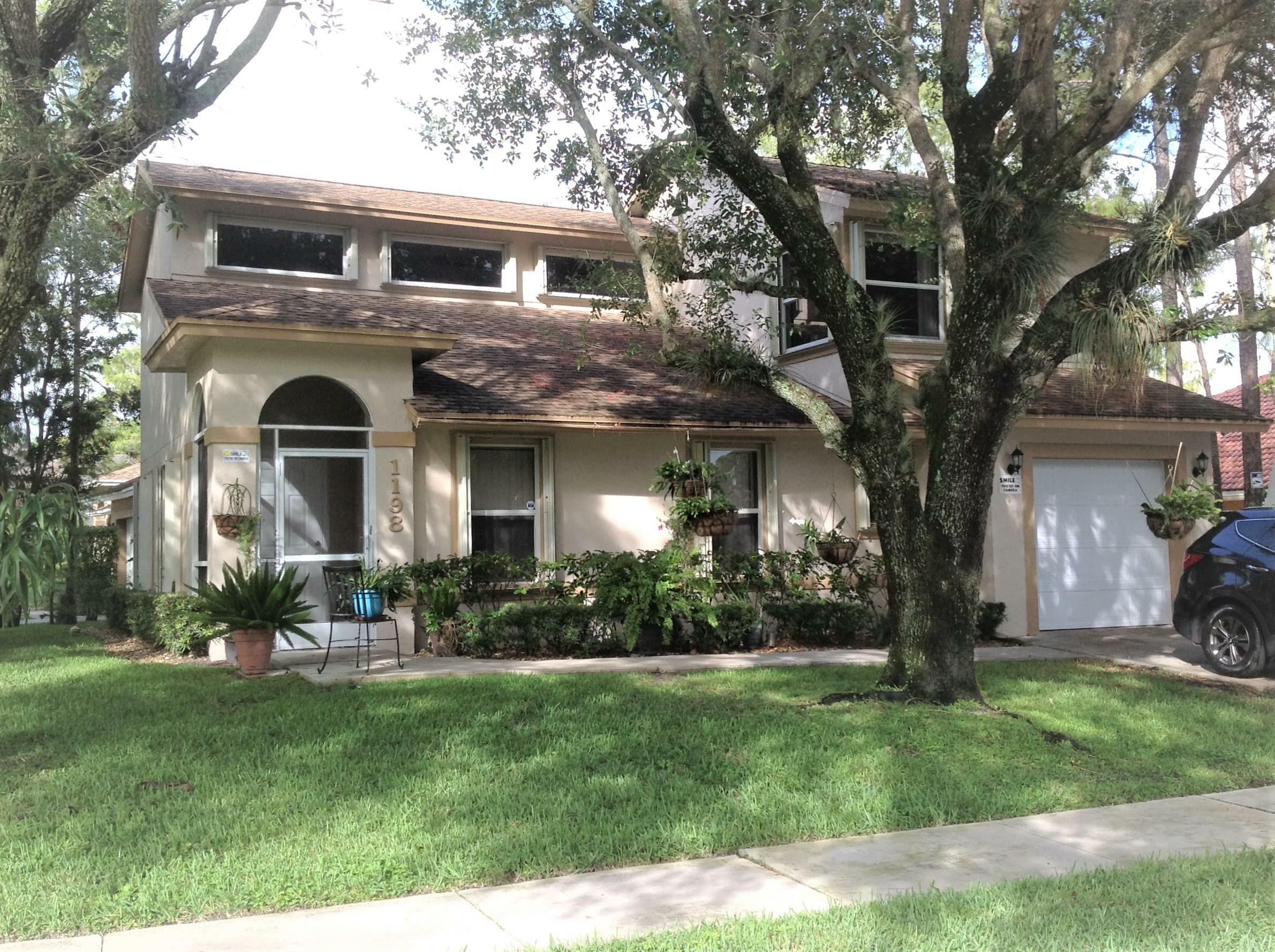 Property Photo:  1198 Amaryllis Court  FL 33414 