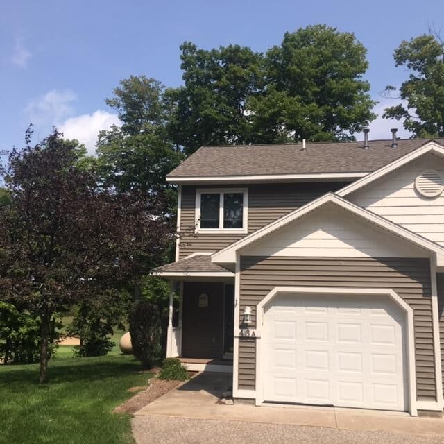 Property Photo:  4778 Tee Lane  MI 49735 