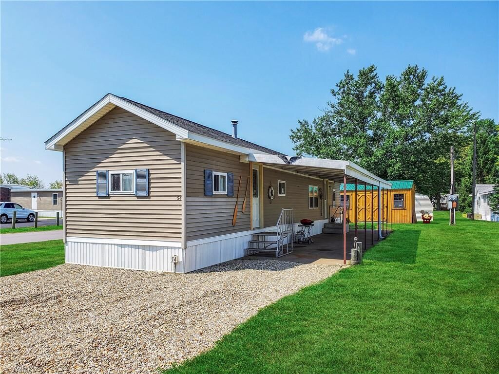 Property Photo:  1600 N Buck Road 54  OH 43440 