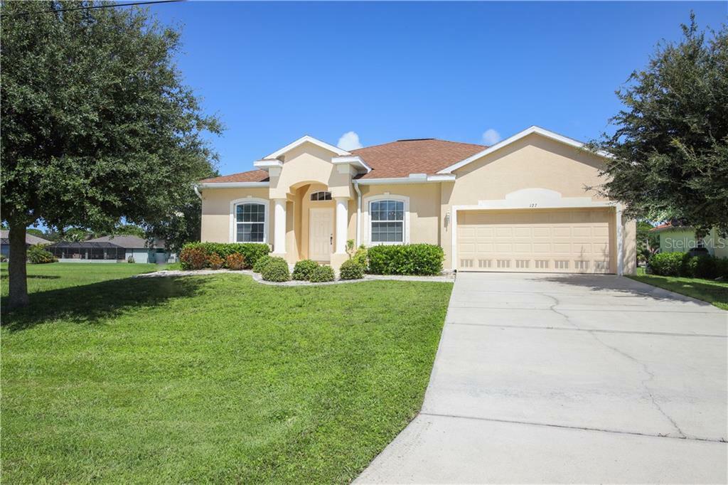 Property Photo: 127 Medalist Road FL 33947