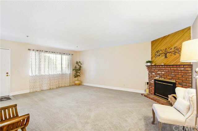 Property Photo:  7715 Newman Avenue 203  CA 92647 