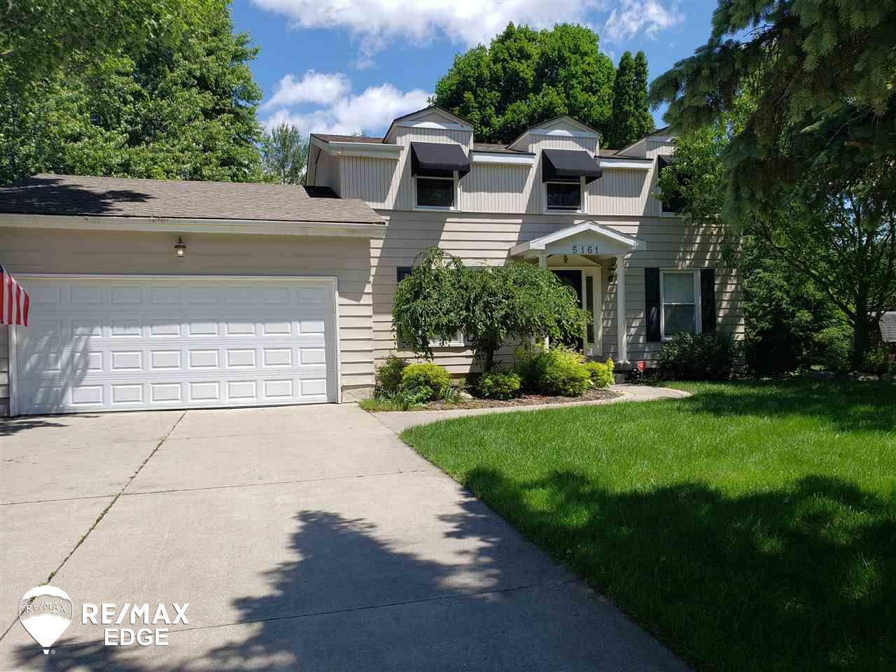 Property Photo:  5161 Candlewood Drive  MI 48439 