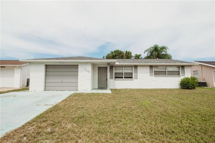 Property Photo: 7335 Bimini Drive FL 34668
