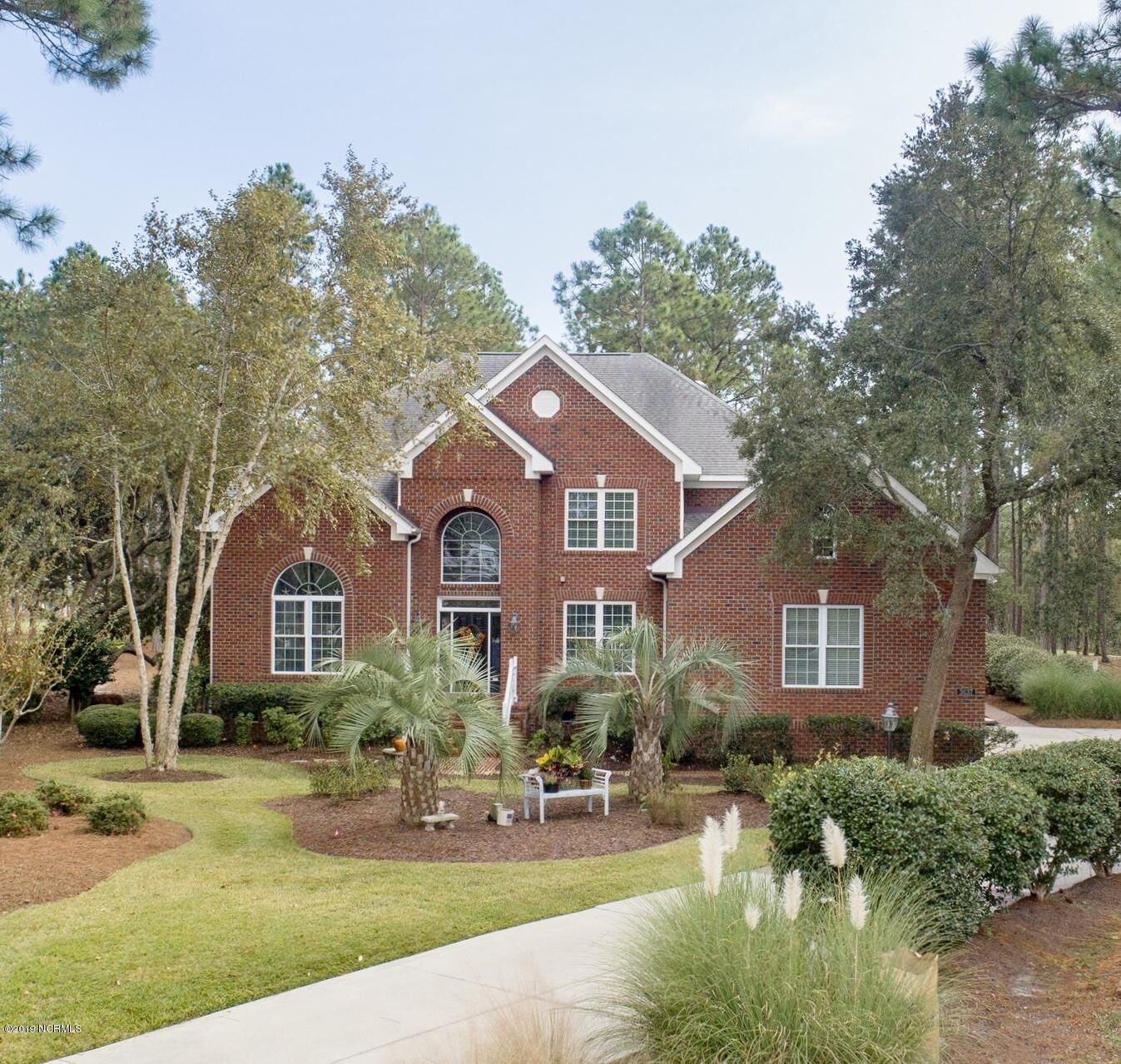Property Photo:  3637 Players Club Drive SE  NC 28461 