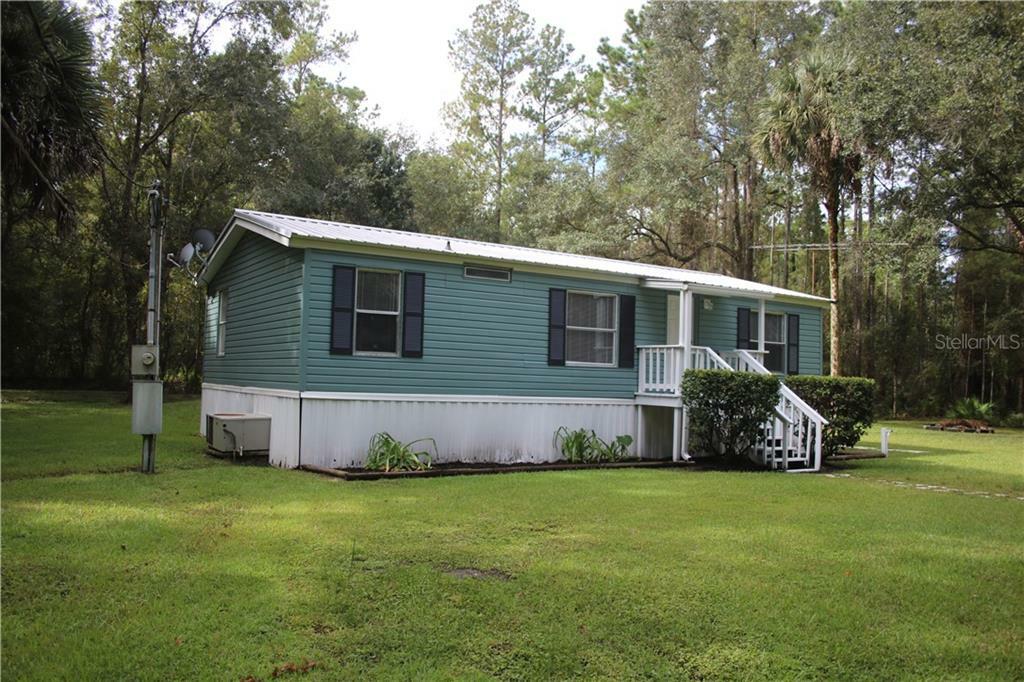 Property Photo:  10300 NE Highway 314  FL 34488 