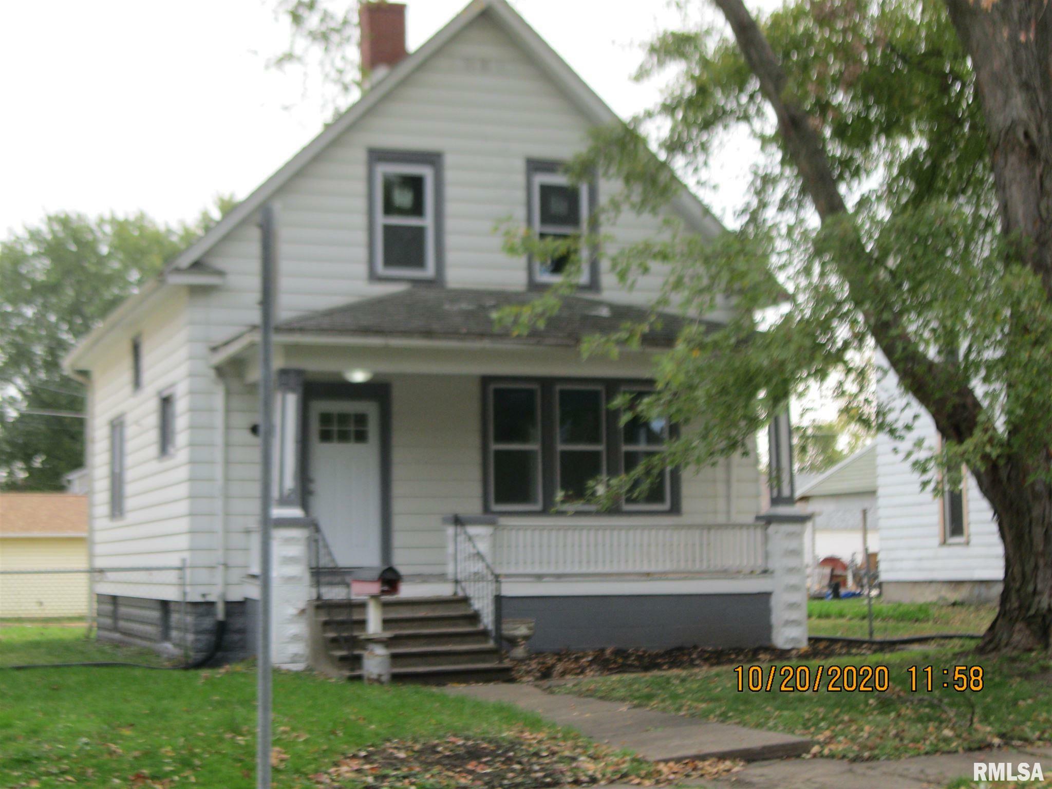 Property Photo:  1427 N 3rd  IA 52732 