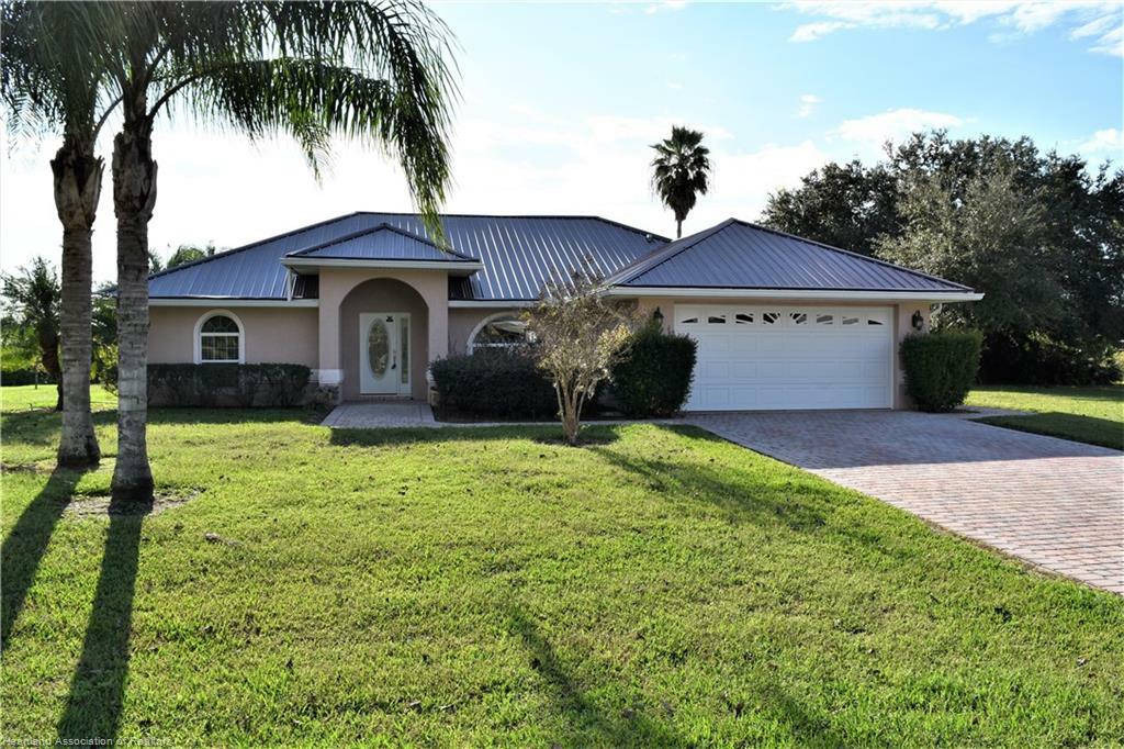 Property Photo:  5811 &Amp 5813 Twisted Oaks Drive  FL 33876 