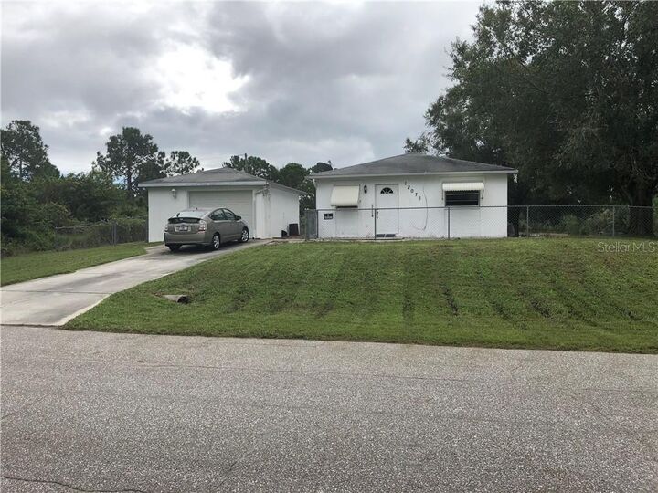 Property Photo: 12071 Diversey Avenue FL 33981