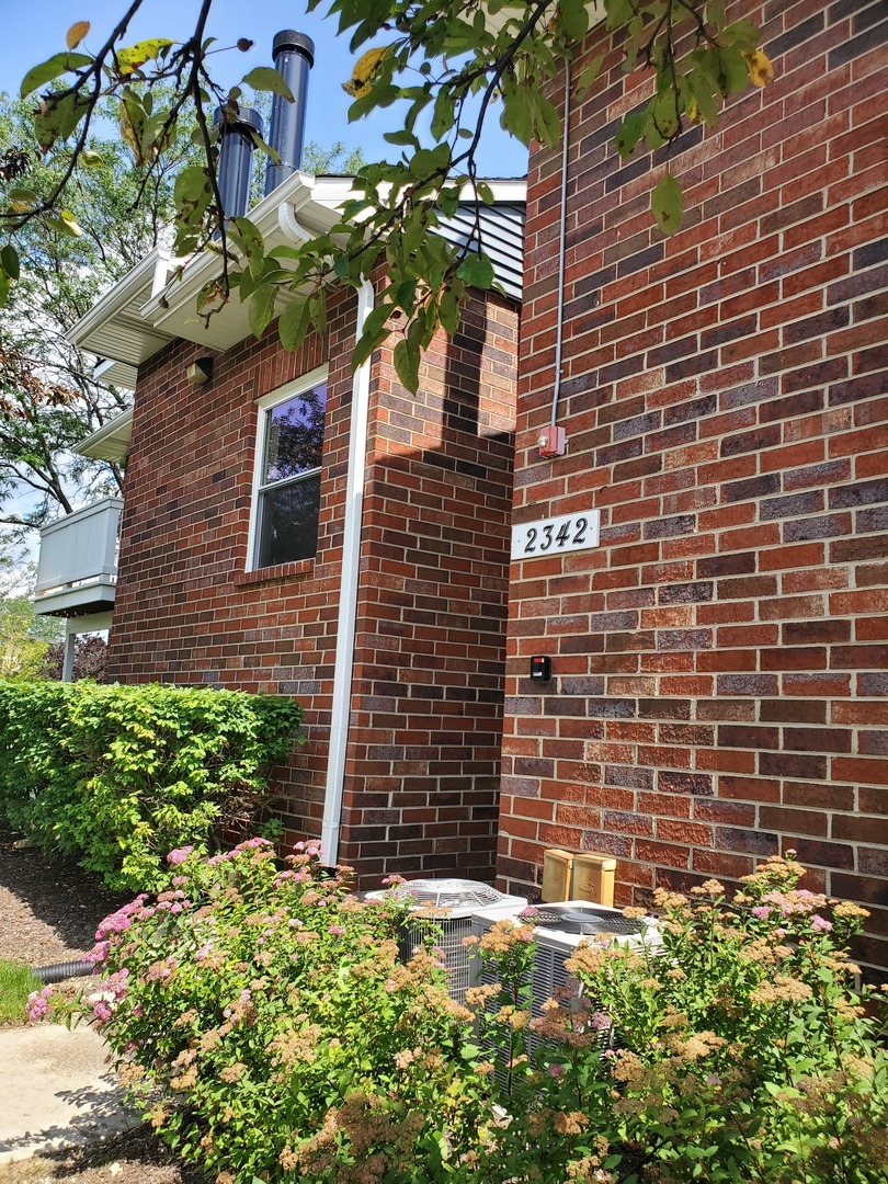 Property Photo:  2342 S Goebbert Road 2077  IL 60005 