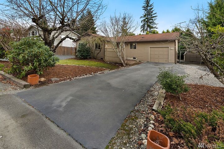 Property Photo:  2411 116th Ave NE  WA 98258 