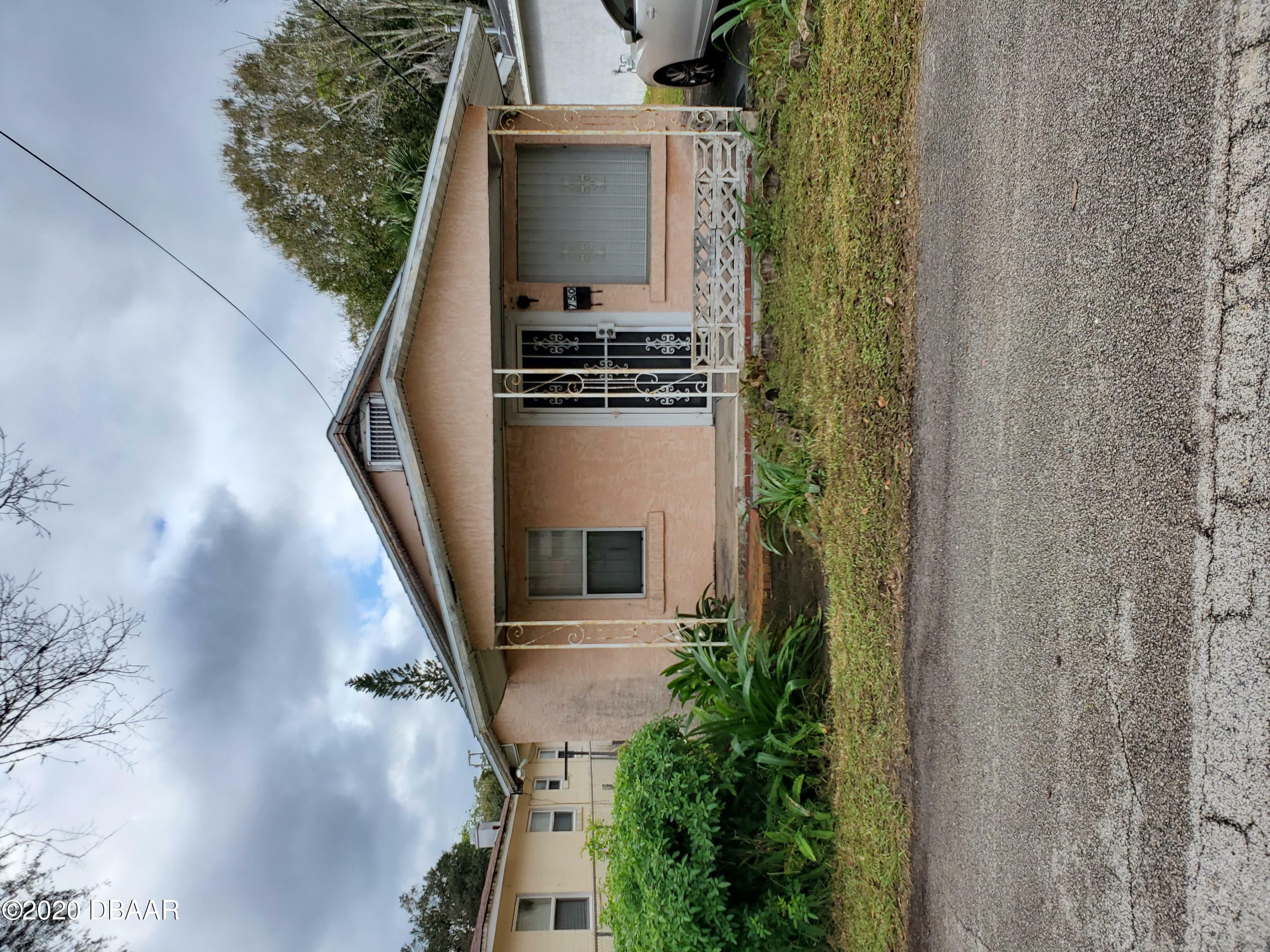 Property Photo:  750 Marion Street  FL 32114 