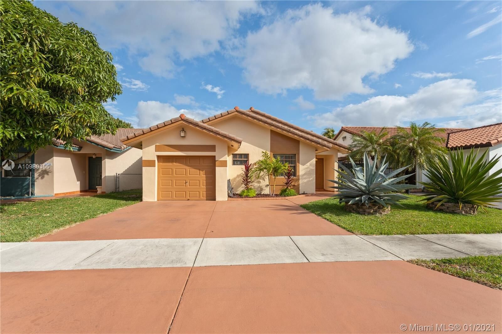 Property Photo: 6911 NW 169th Ter FL 33015