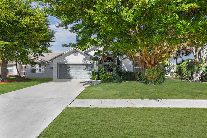 Property Photo:  12865 Meadowbreeze Drive  FL 33414 