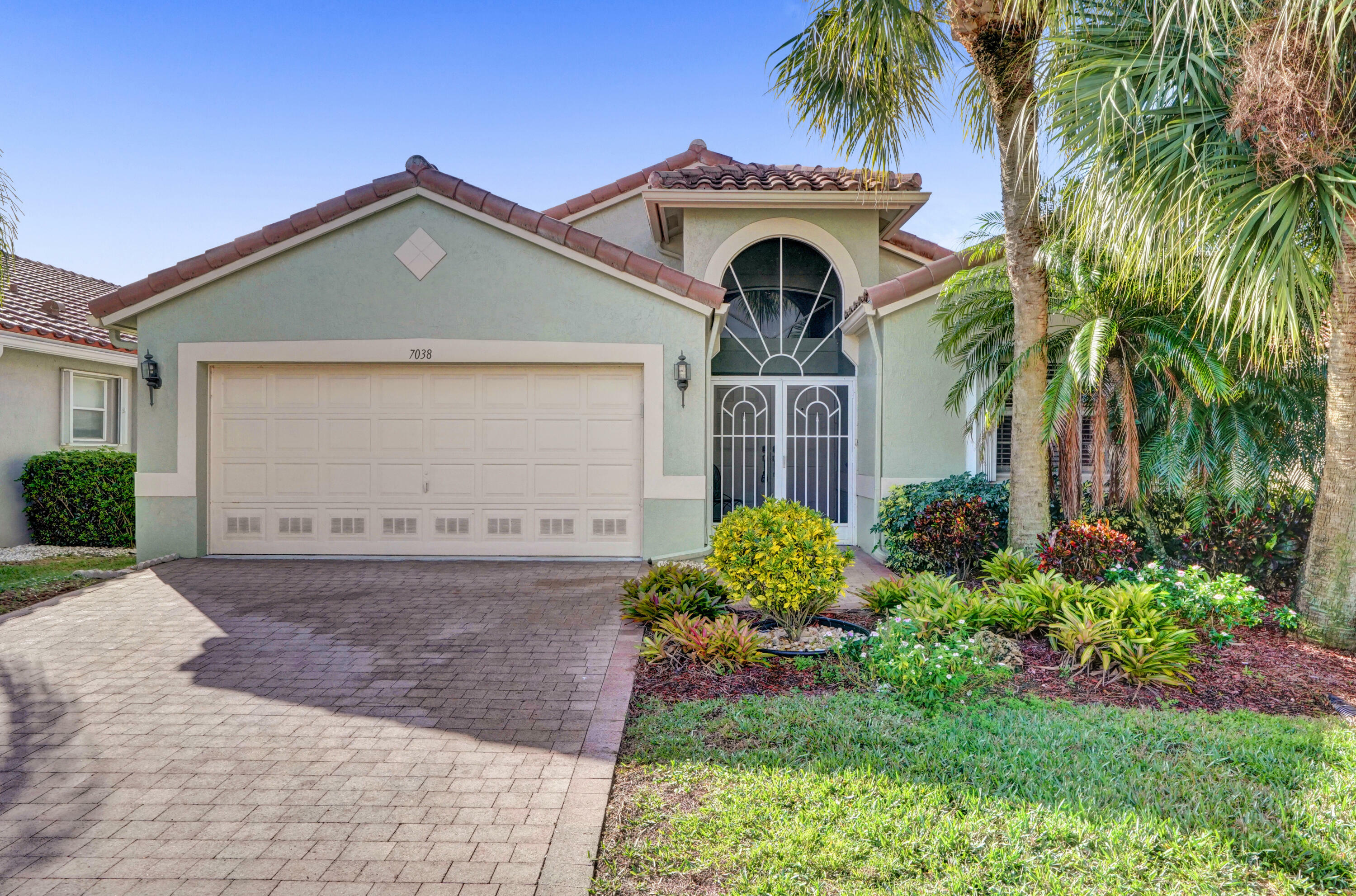 Property Photo:  7038 Haviland Circle  FL 33437 