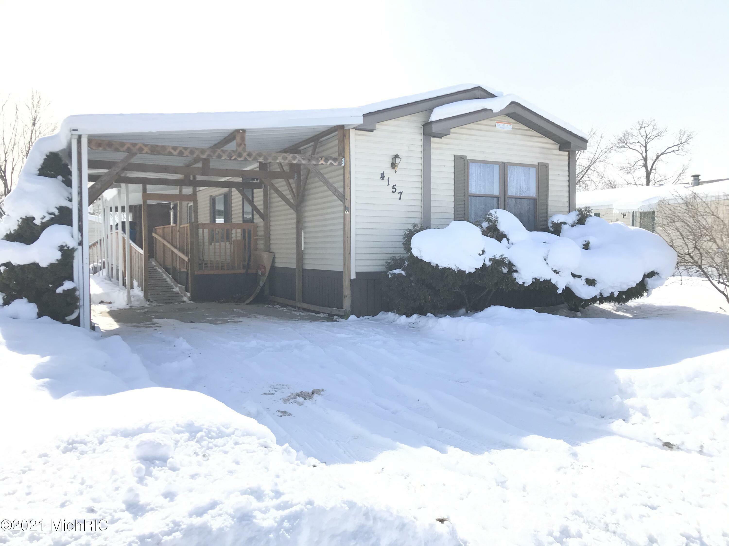 Property Photo:  4157 Squaw Creek Trail  MI 49442 