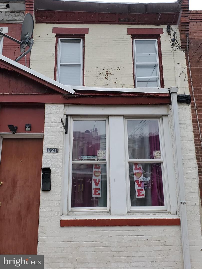 Property Photo: 821 E Woodlawn Avenue PA 19138