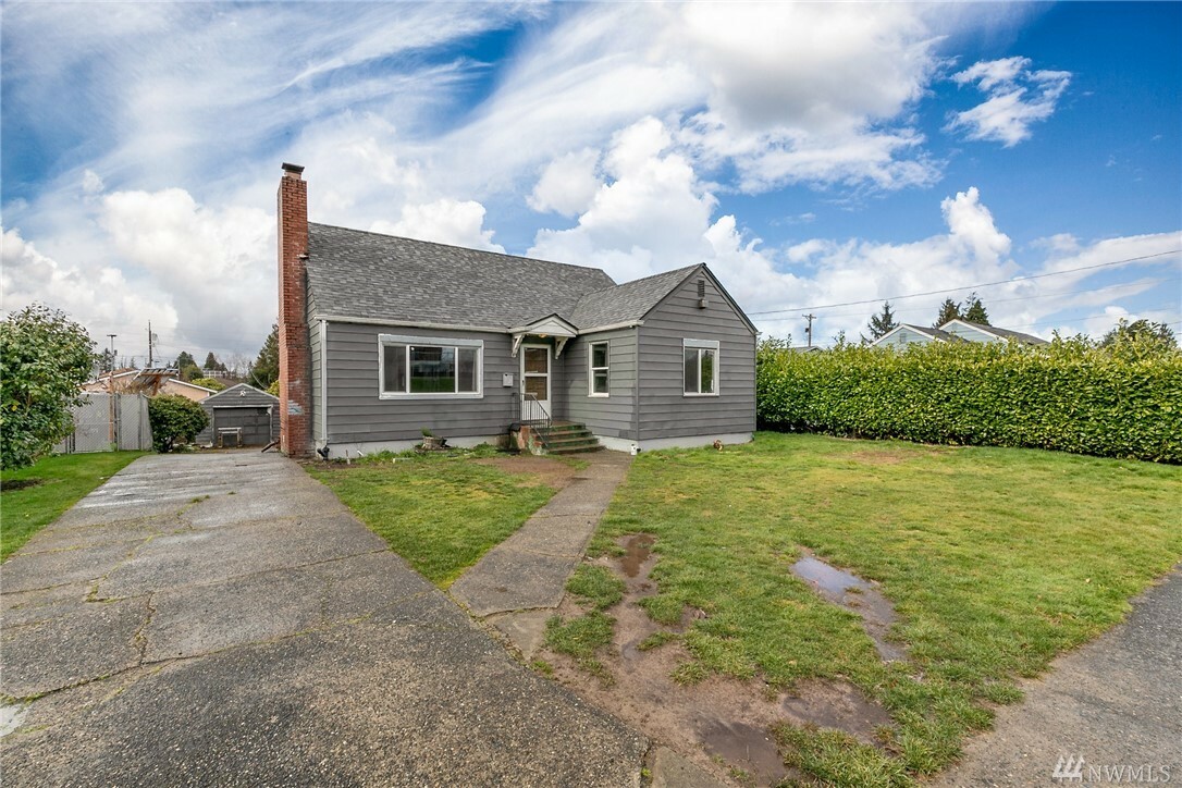 Property Photo:  6012 A St  WA 98408 