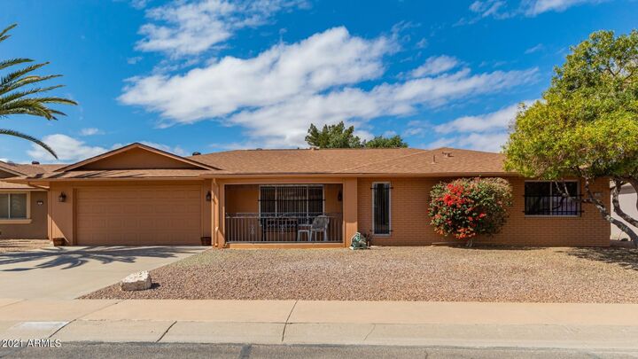 Property Photo: 17018 N 95th Drive AZ 85373