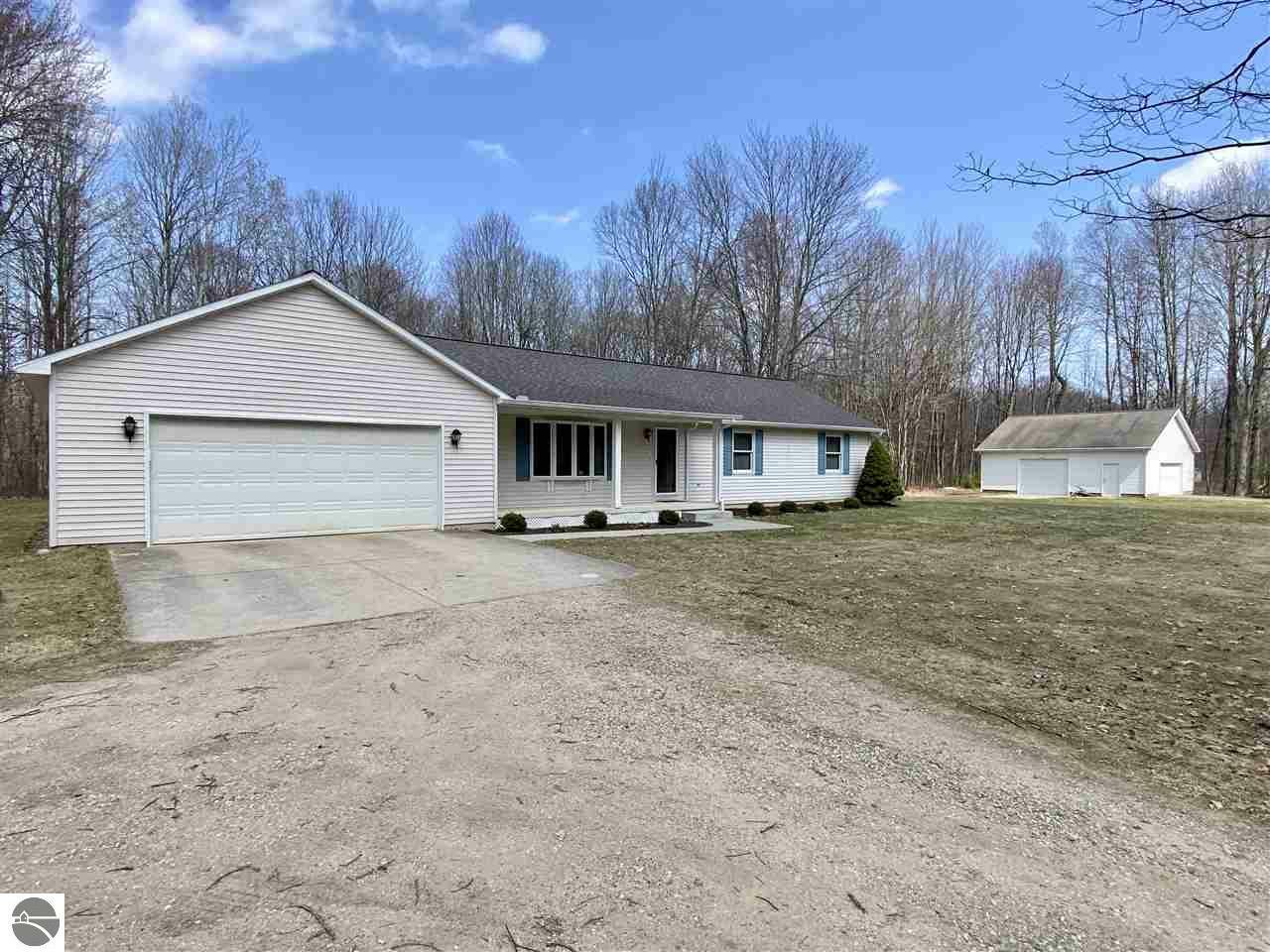 Property Photo:  11853 E 30 3/4 Road  MI 49601 