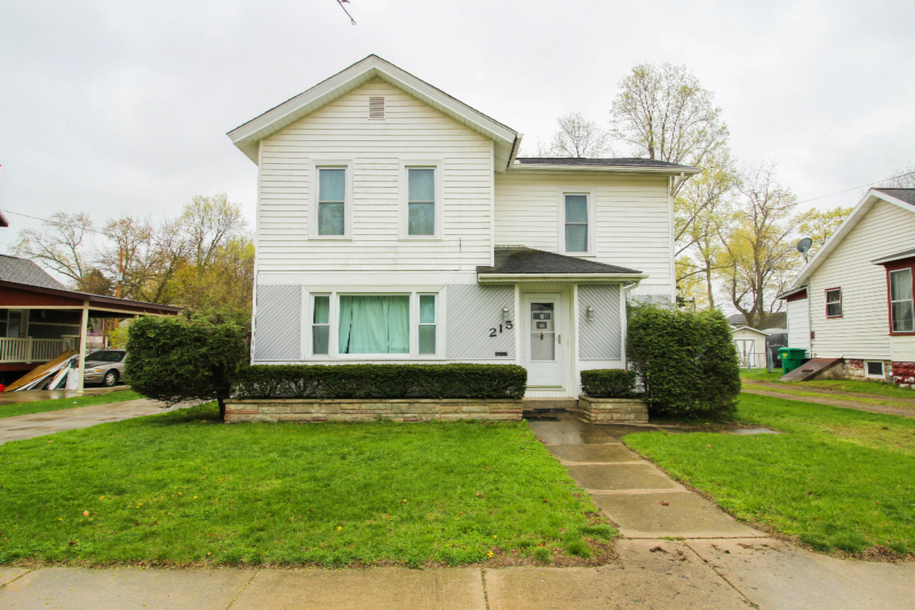 Property Photo:  215 Fourth Avenue  MI 49093 