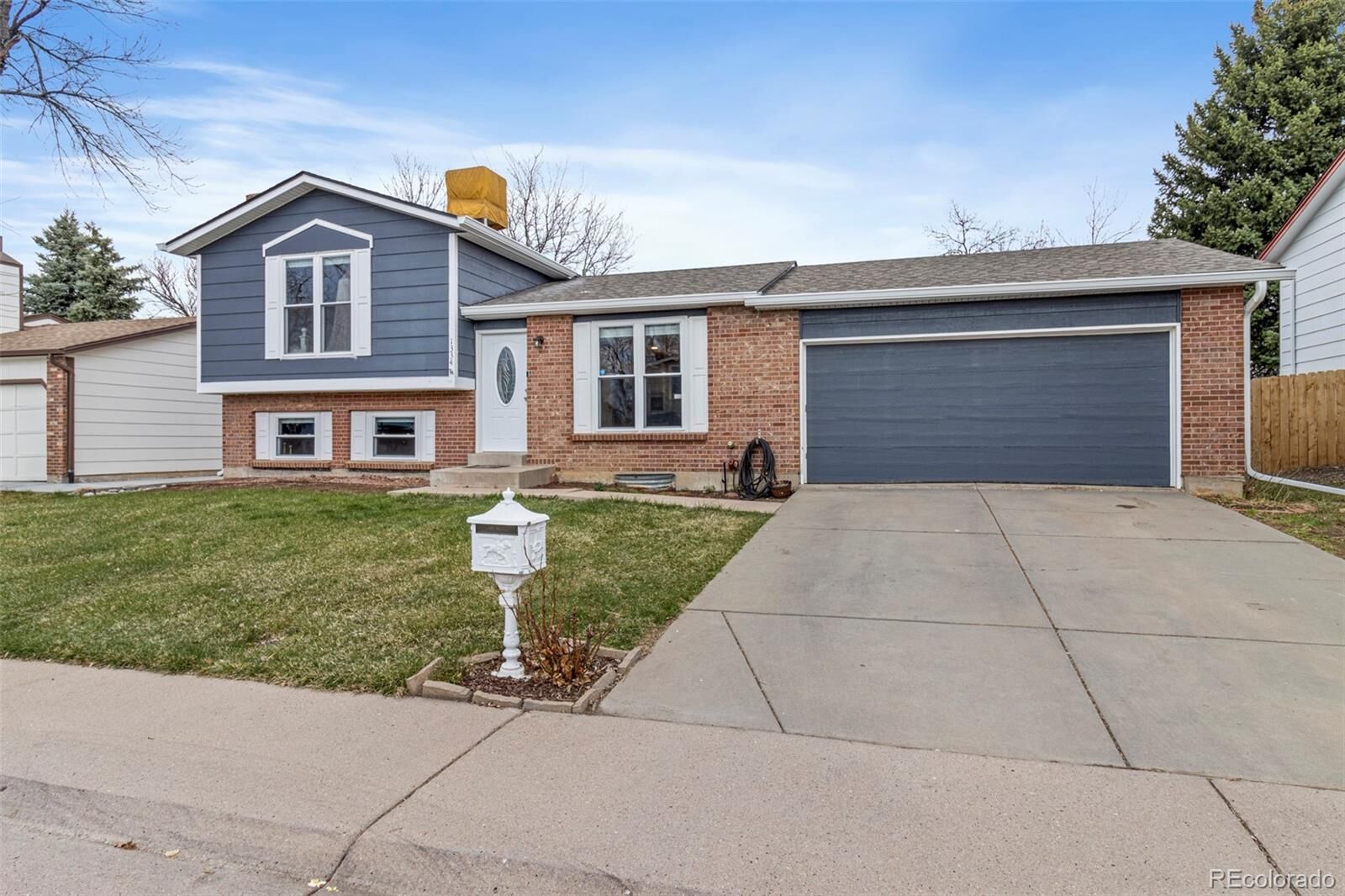 Property Photo:  1334 S Zeno Street  CO 80017 