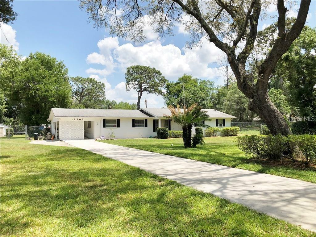 Property Photo:  12709 N 53rd Street  FL 33617 