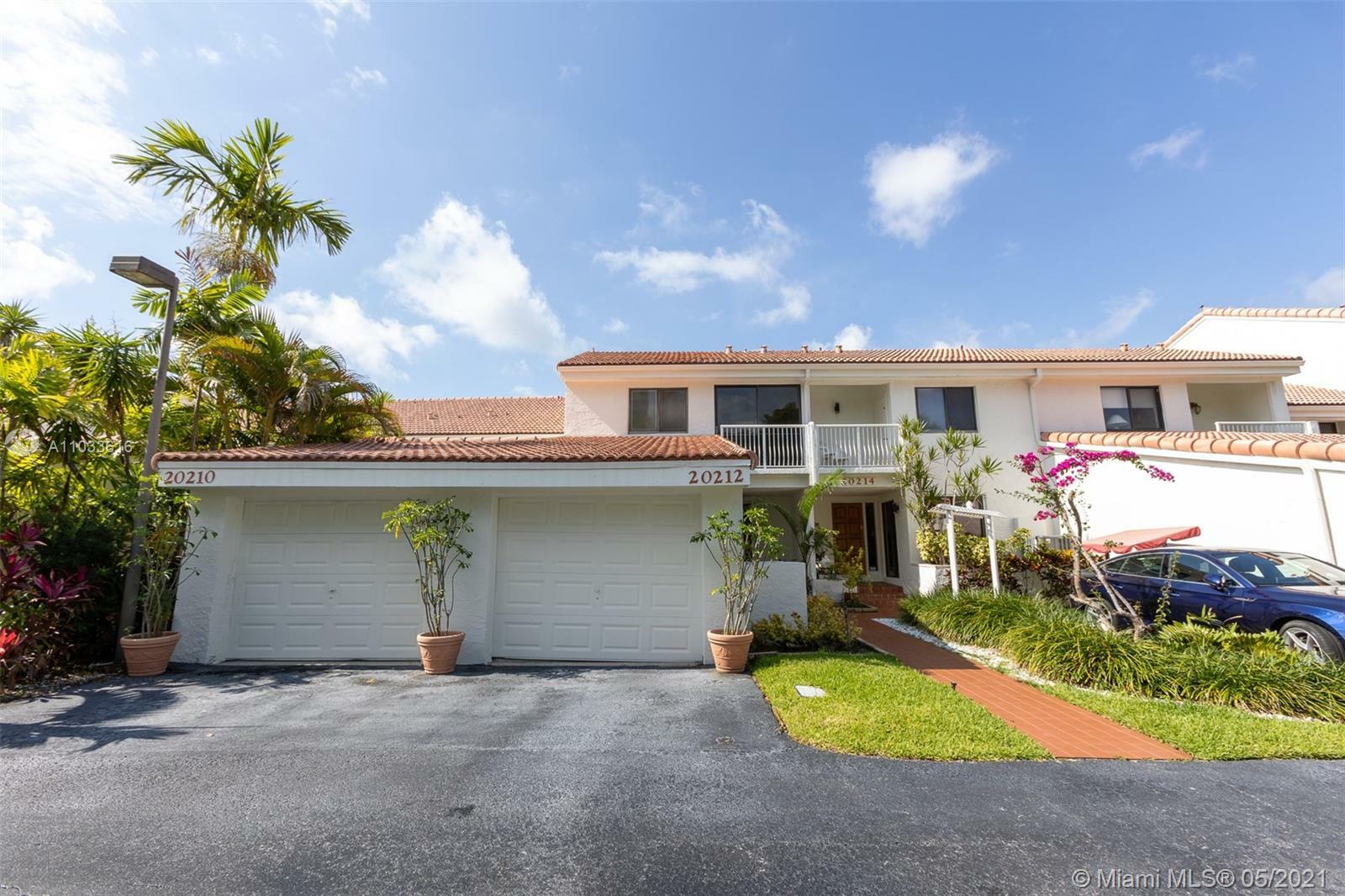 Property Photo:  20212 NE 34th Ct 55-A  FL 33180 