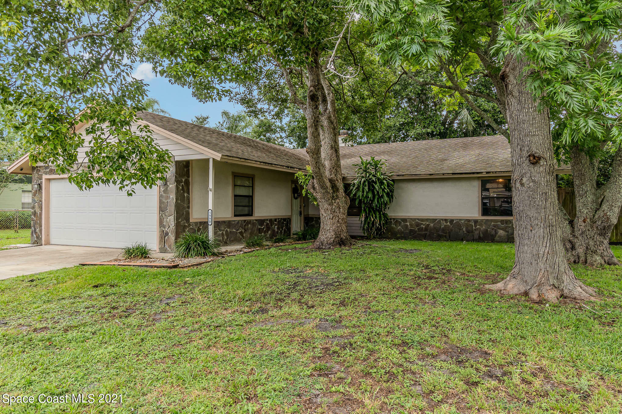 Property Photo:  5990 Gilson Avenue  FL 32927 