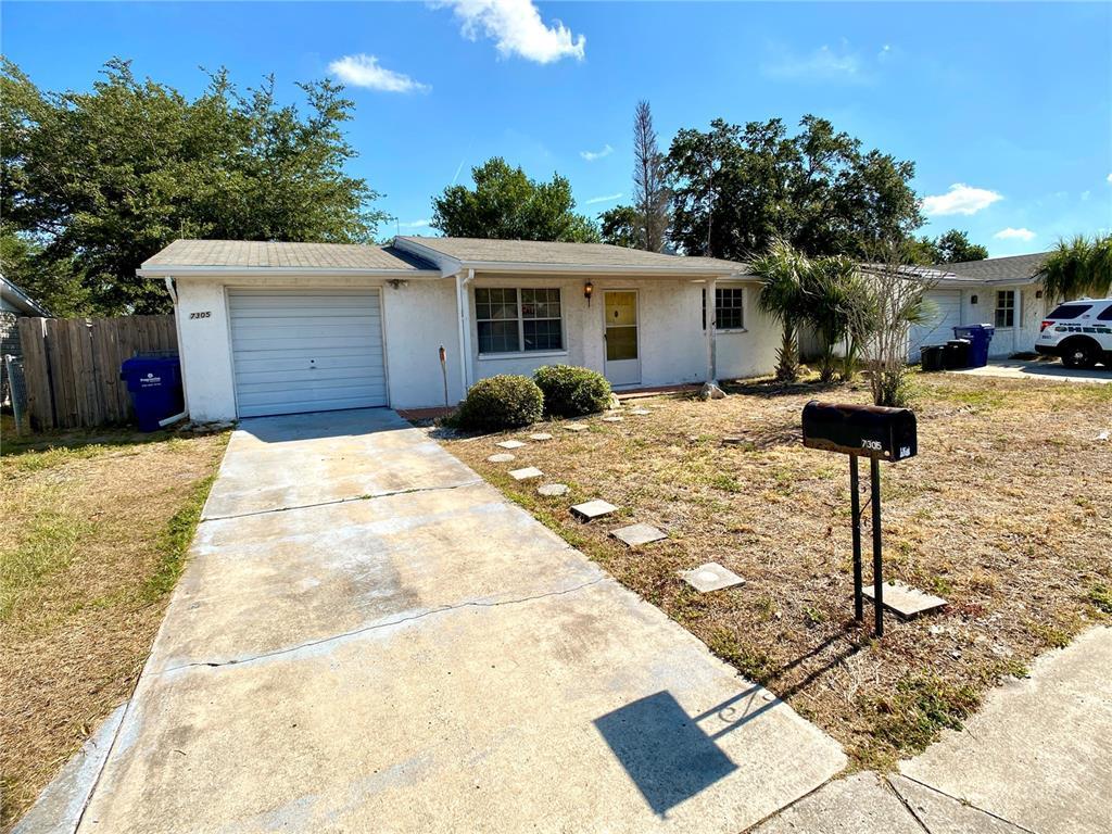 Property Photo: 7305 Castanea Drive FL 34668