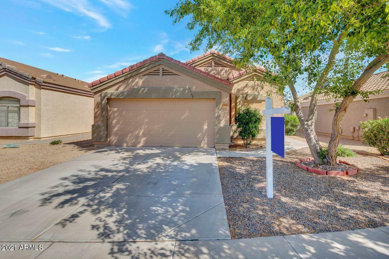 Property Photo: 12706 W Santa Fe Lane AZ 85335
