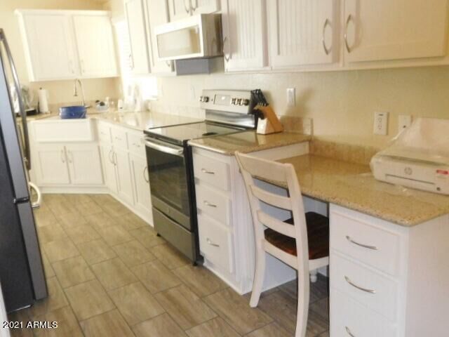 Property Photo:  17200 W Bell Road 1404  AZ 85374 