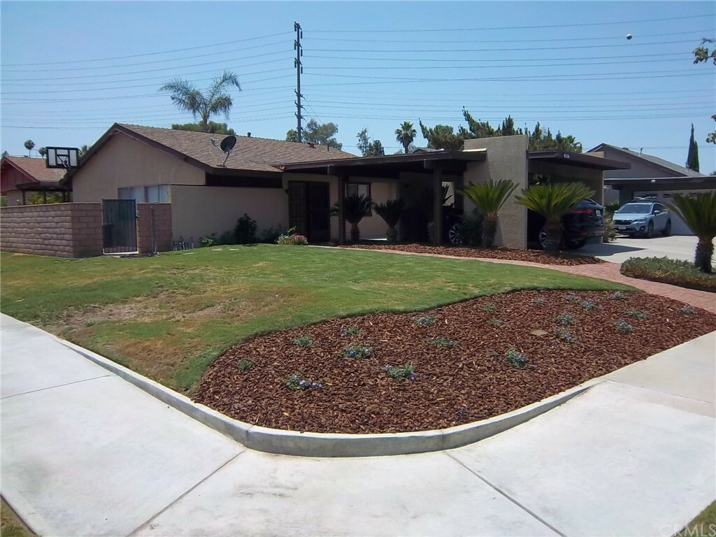 Property Photo:  5025 Pear Blossom  CA 92507 